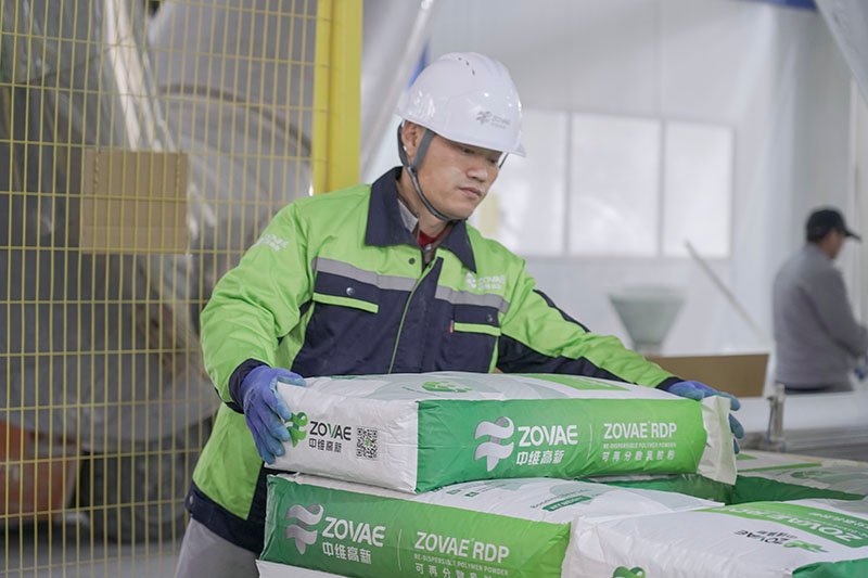 Zovae-Factory-Worker-Put-Product