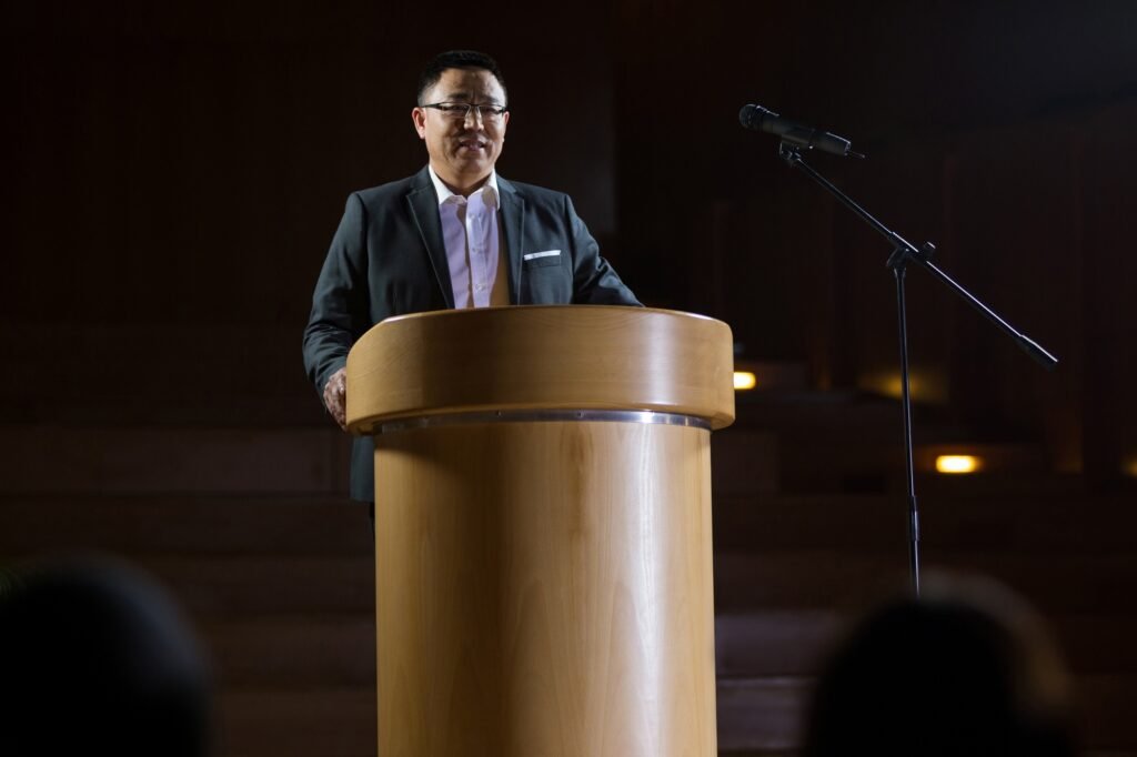 Business executive giving a speech