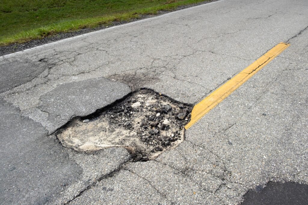 dangerous-pothole-on-american-road-surface-ruined-driveway-in-urgent-need-of-repair